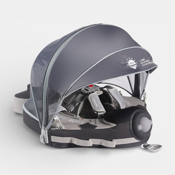 Mambobaby Float No.7 airplane gray with canopy and tail, infant in FoamCore TriPose Ultra float on water, shadow jet design.