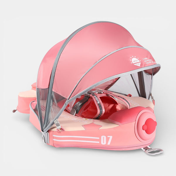 Pink FoamCore Ultra TriPose Aero baby float with canopy and tail on water, child inside, UPF sun shade up.