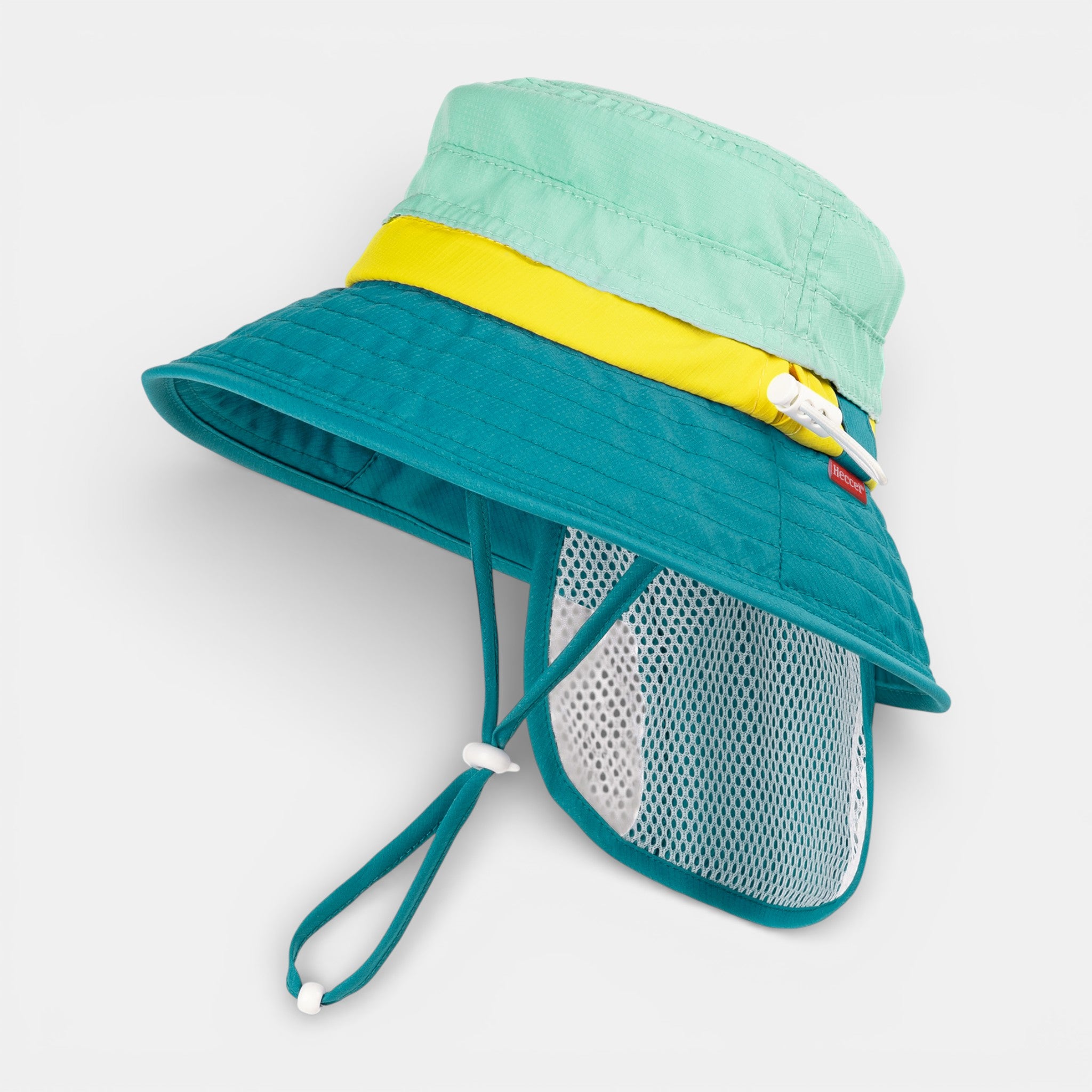 A green DryShade SkyCandy Sun Hat with neck flap, UPF 50+ fabric for outdoor baby sun protection.