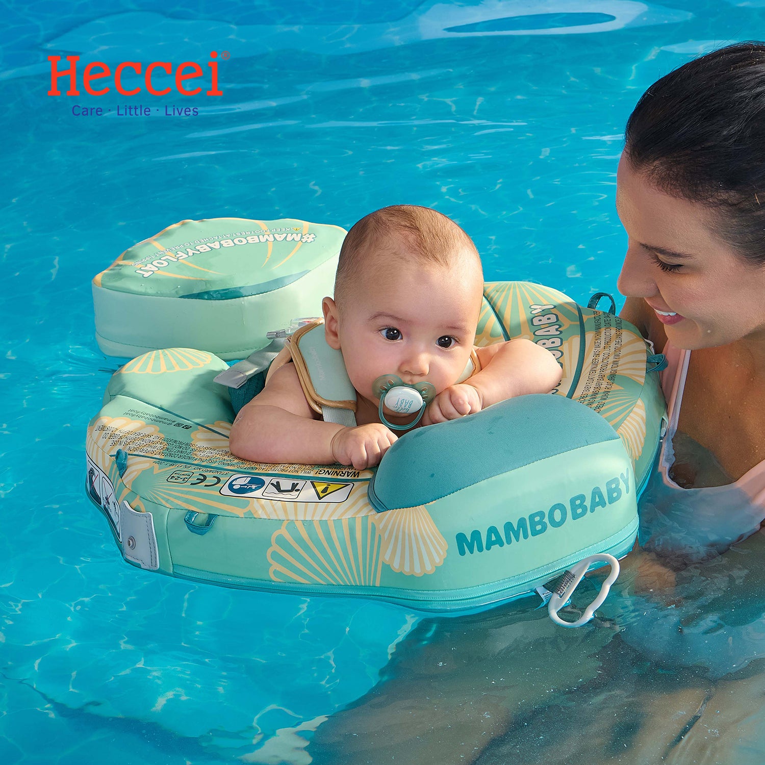 FoamCore Ultra Seashell baby swim float in aqua, with canopy, harness vest, and leg support for safe water play.