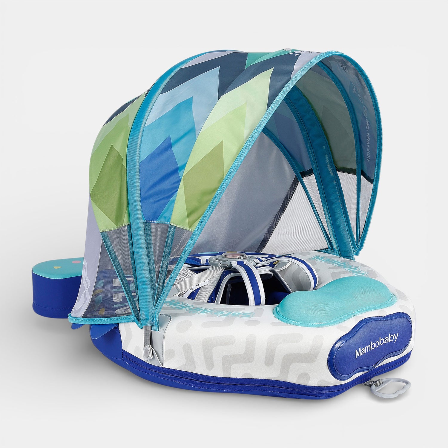 A baby wearing the Mambobaby Bumblebee FoamCore Ultra float with wide canopy, in an ocean fish design, floating safely in wat