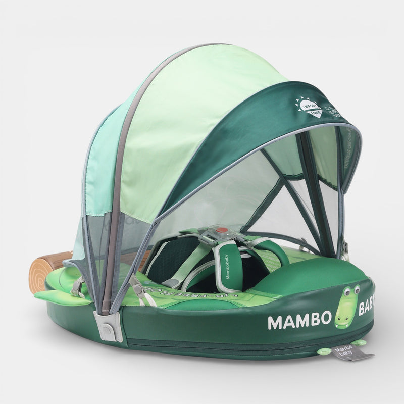 Baby lying on back in green crocodile-shaped foam pool float with UPF canopy under blue sky. FoamCore™ Ultra – Crocodile. gde