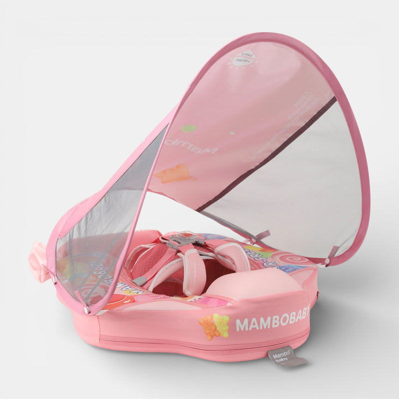 Mambobaby float rainbow FoamCore Deluxe with baby in pink canopy, blue seat, on water.